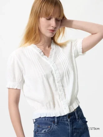 Camicetta da donna in cotone dobby con scollo a V