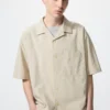 Camicie unisex con collo aperto | Maniche corte Camicie unisex con collo aperto | Maniche corte