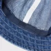 Cappellino Metro in denim unisex con protezione UV