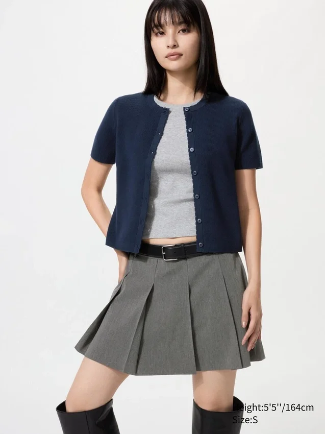 Cardigan da donna con bordi smerlati Cardigan da donna con bordi smerlati