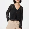 Cardigan da donna con collo a V lavorato all’uncinetto Cardigan da donna con collo a V lavorato all’uncinetto