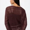 Cardigan da donna con collo a V lavorato all’uncinetto Cardigan da donna con collo a V lavorato all’uncinetto