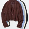 Cardigan da donna con collo a V lavorato all’uncinetto Cardigan da donna con collo a V lavorato all’uncinetto