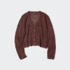 Cardigan da donna con collo a V lavorato all’uncinetto Cardigan da donna con collo a V lavorato all’uncinetto