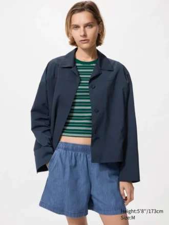 Giacca corta da donna con collo aperto in pantaloncini Giacca corta da donna con collo aperto in pantaloncini
