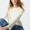 Maglione da donna con mini trecce Maglione da donna con mini trecce