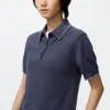 Maglione polo da donna a maniche corte in pantaloncini Maglione polo da donna a maniche corte in pantaloncini