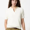 Maglione polo da donna a maniche corte in pantaloncini Maglione polo da donna a maniche corte in pantaloncini