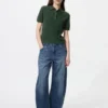 Maglione polo da donna a maniche corte in pantaloncini Maglione polo da donna a maniche corte in pantaloncini