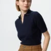 Maglione polo da donna in cotone a punto traforato Maglione polo da donna in cotone a punto traforato