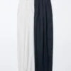 Pantaloni larghi a pieghe in cotone e lyocell da donna Pantaloni larghi a pieghe in cotone e lyocell da donna