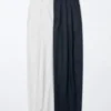 Pantaloni larghi a pieghe in cotone e lyocell da donna Pantaloni larghi a pieghe in cotone e lyocell da donna