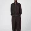 Pantaloni sportivi larghi unisex in tessuto spazzolato Pantaloni sportivi larghi unisex in tessuto spazzolato