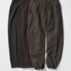 Pantaloni sportivi larghi unisex in tessuto spazzolato Pantaloni sportivi larghi unisex in tessuto spazzolato