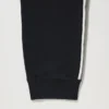 Pantaloni sportivi unisex con strisce laterali | Taglia alta Pantaloni sportivi unisex con strisce laterali | Taglia alta