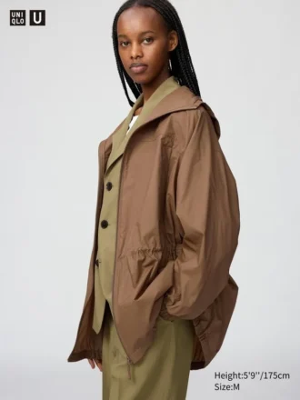 Parka oversize trasparente con protezione UV da donna