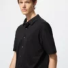 Polo unisex in piqué di cotone AIRism completamente aperta