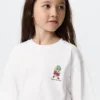 T-shirt con stampa Pop Mart UT per bambini T-shirt con stampa Pop Mart UT per bambini