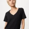 T-shirt da donna in cotone fiammato con scollo a V T-shirt da donna in cotone fiammato con scollo a V