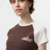 T-shirt grafica da donna con personaggi allegri UT T-shirt grafica da donna con personaggi allegri UT