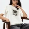 T-shirt grafica Monchhichi UT da donna